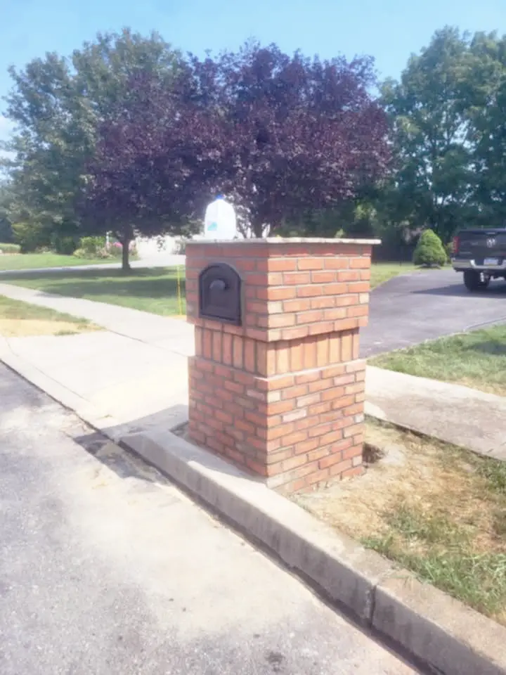 Custom brick mailbox with detailed brickwork by Rhinesmith Masonry showing craftsmanship and attention to detail