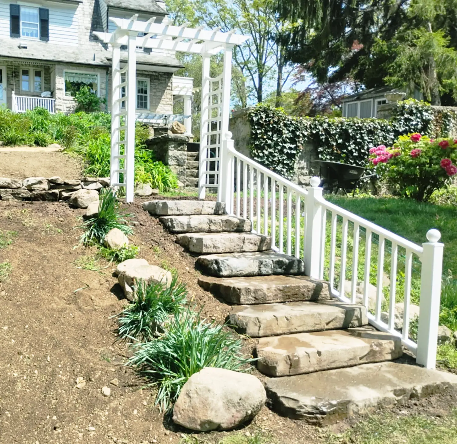 Beautiful natural stone steps crafted by Rhinesmith Masonry with hand-selected stones